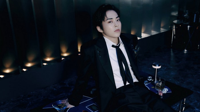 Xiumin in a Black Suit with a Tie