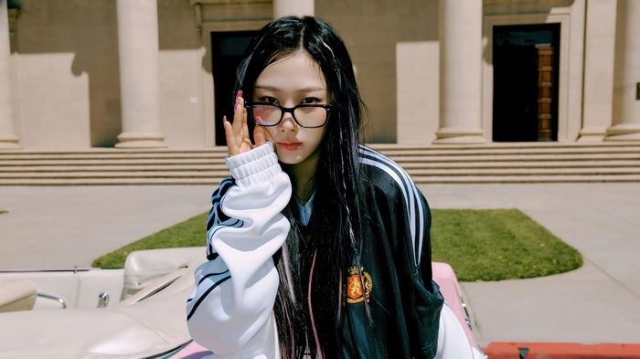 Giselle from Aespa wearing glasses