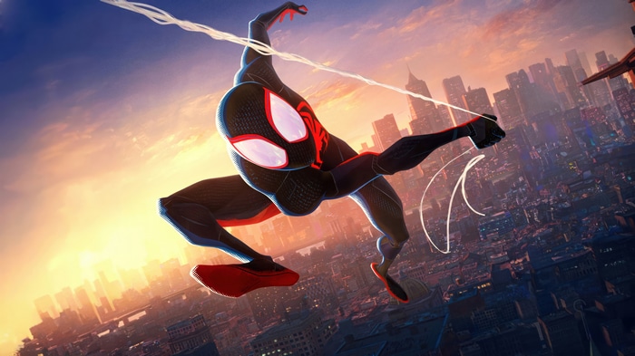 Miles Morales swinging through a city at sunset