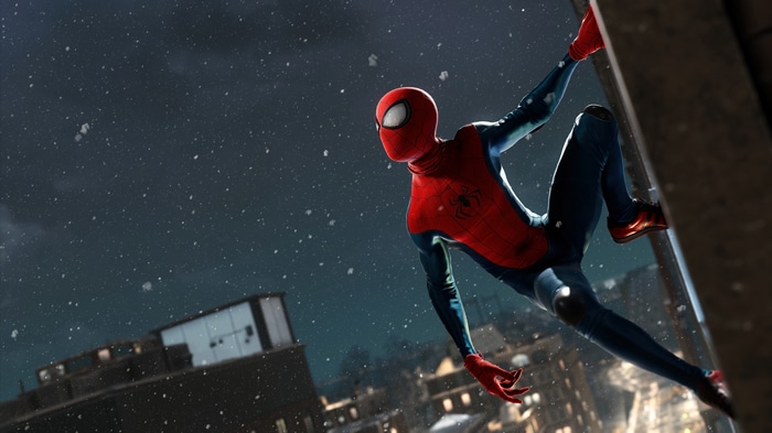 Marvel's Spider-Man climbing a building in snow