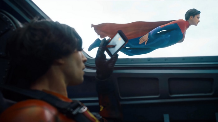 Supergirl flying outside a vehicle in The Flash 4K