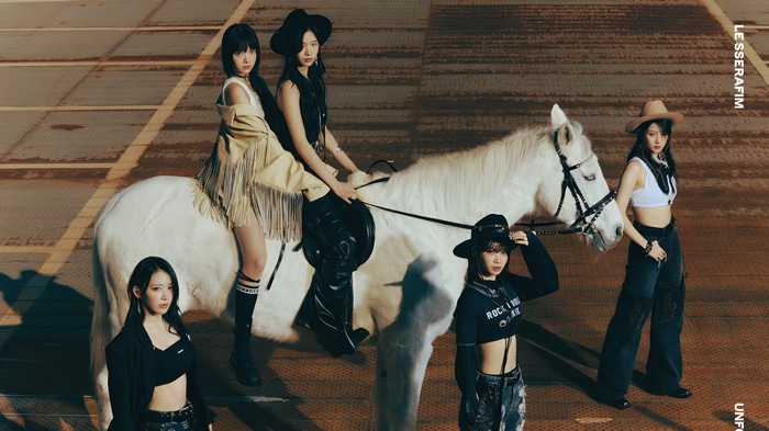 LE SSERAFIM members on a white horse in UNFORGIVEN