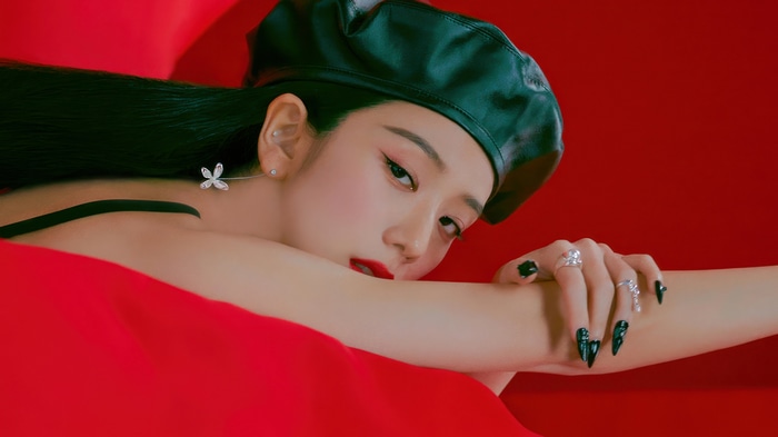 Jisoo in a black beret and red outfit