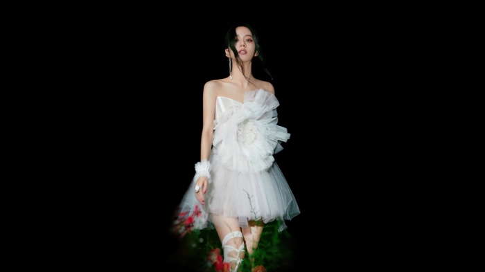 Jisoo in a white dress with flowers