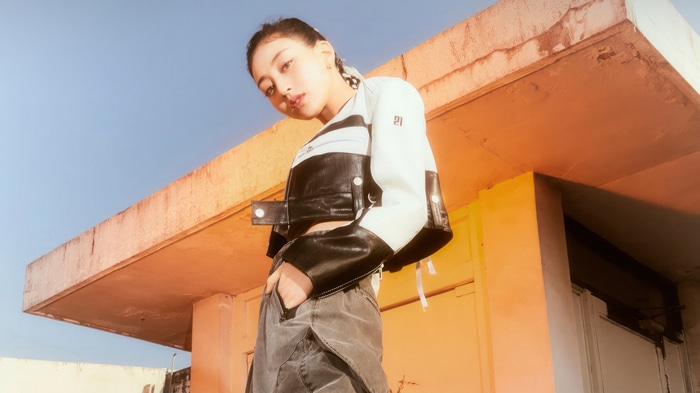Jihyo of TWICE in a black and white jacket