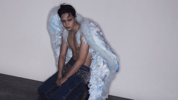 Kai from EXO with blue wings