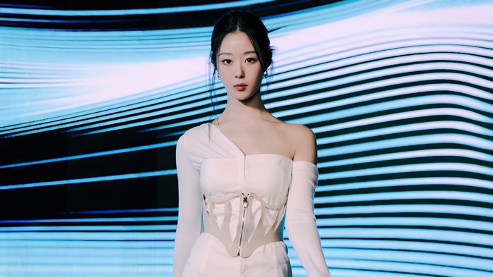 Chaerin of Cherry Bullet in a white outfit