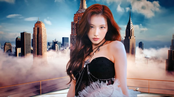 Sana from TWICE in a city skyline