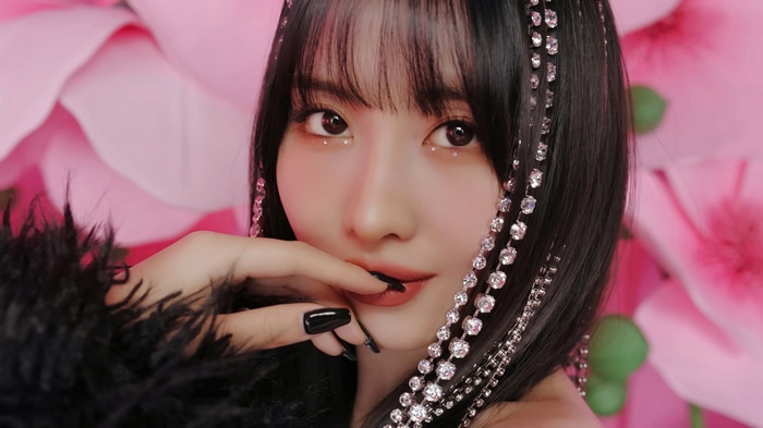 Momo from TWICE with sparkling hair accessories