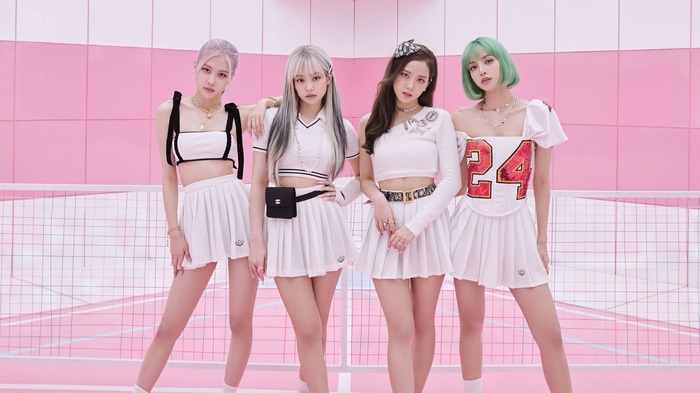 BLACKPINK members Rose, Jennie, Jisoo, and Lisa in white outfits