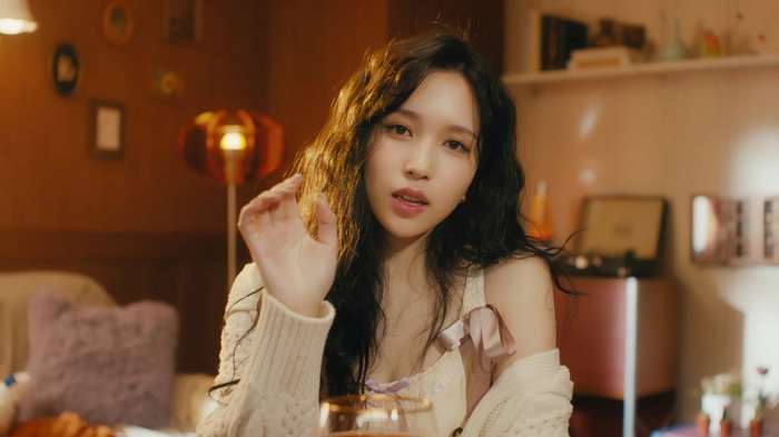 Mina from TWICE in a cozy room