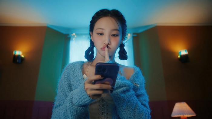 Nayeon of TWICE holding a phone