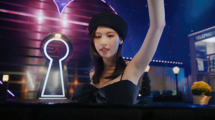 TWICE Sana in a black dress and beret