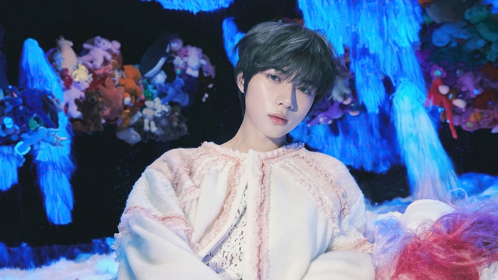 Beomgyu of TXT in colorful, surreal setting 4K