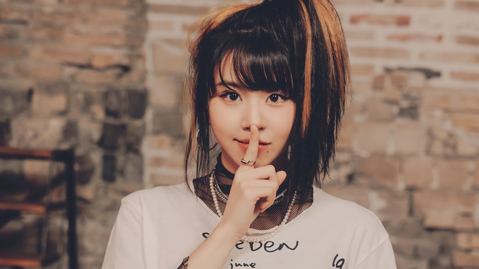 Chaeyoung from TWICE with finger on lips