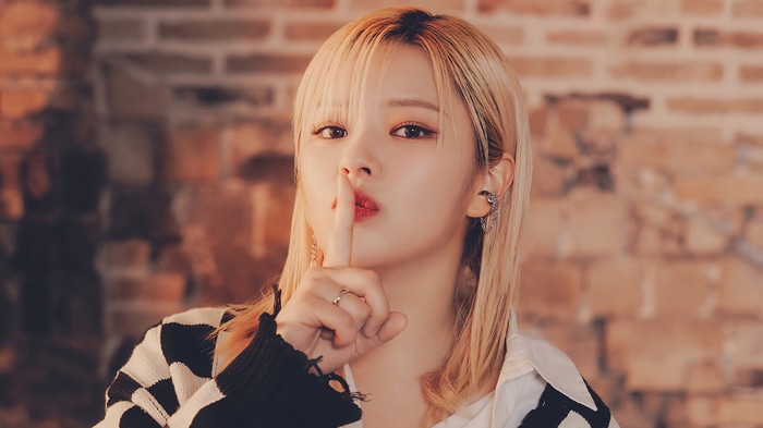 Jeongyeon of TWICE with finger on lips