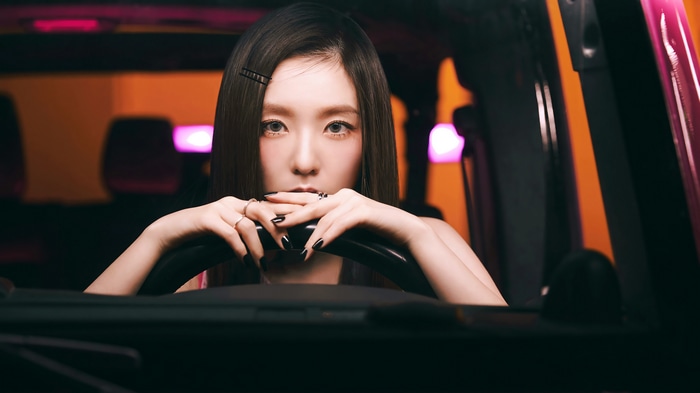 Irene from Red Velvet driving a car