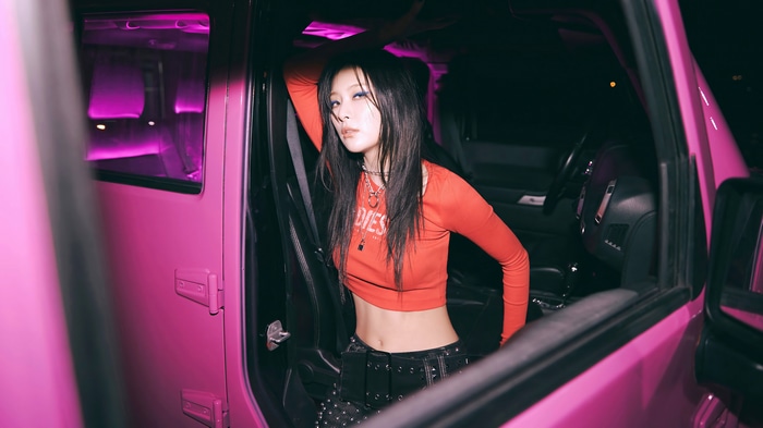 Seulgi in a pink car