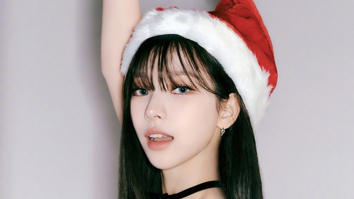 Karina from Aespa wearing a Santa hat