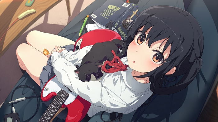 Azusa Nakano with a guitar and a cat