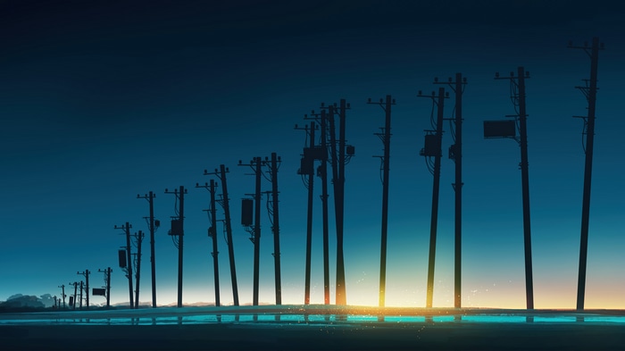 Sunrise over a line of utility poles