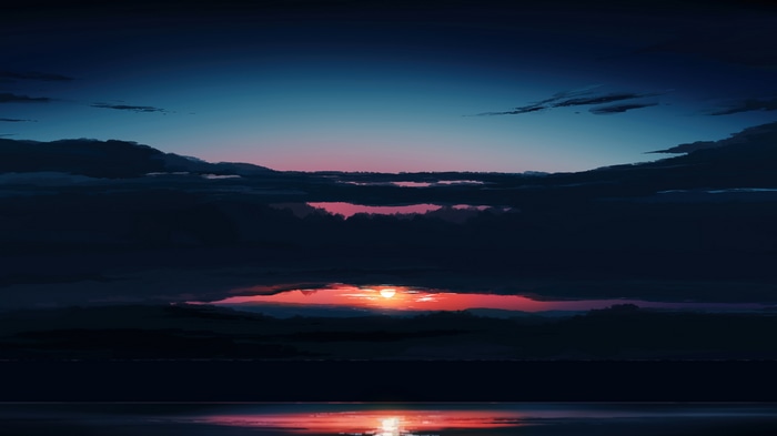 Sunset over the ocean with clouds