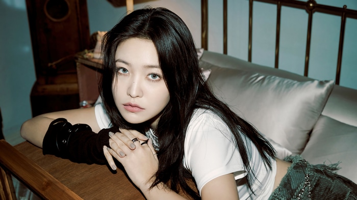 Yeri from Red Velvet posing on a bed