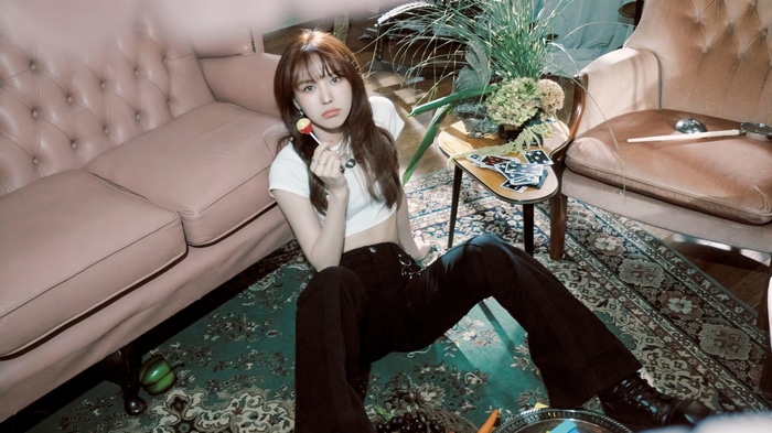 Wendy from Red Velvet holding a lollipop
