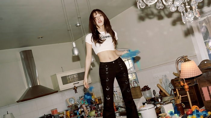 Wendy (Red Velvet) in a kitchen setting