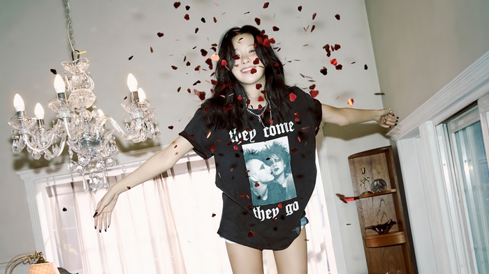 Seulgi of Red Velvet with falling red petals