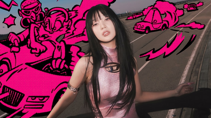 Joy from Red Velvet in a pink dress