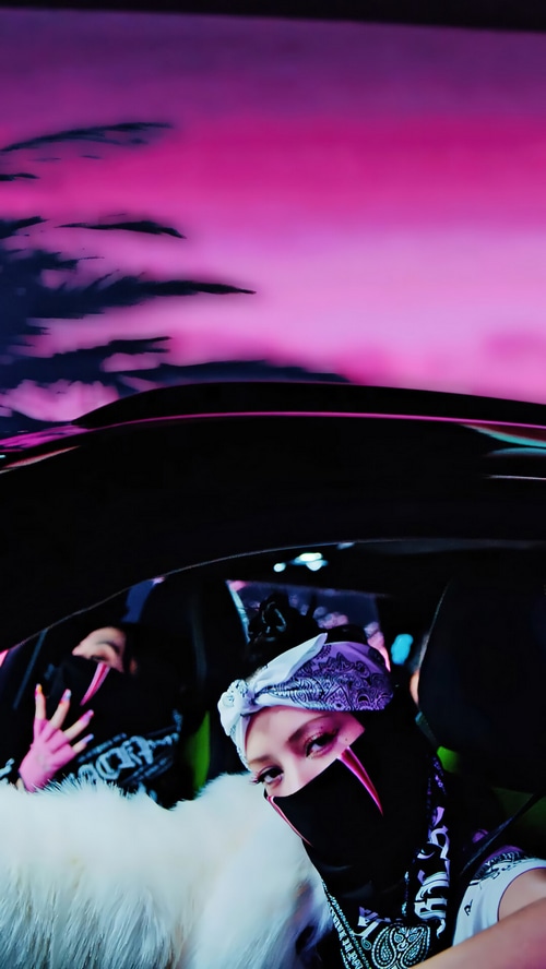BLACKPINK Lisa in a car with pink sky