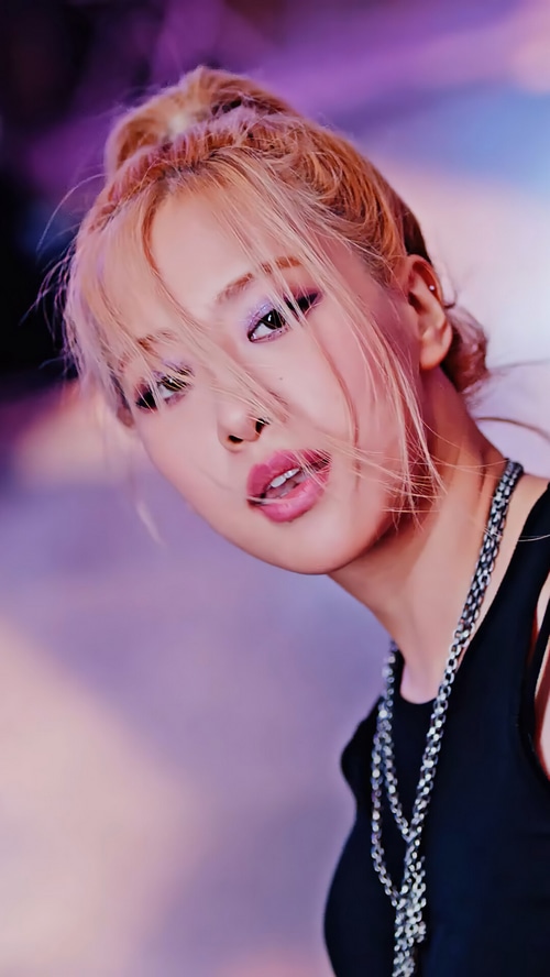Rosé from BLACKPINK with blonde hair and makeup