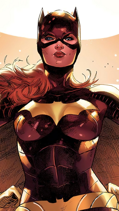 Batgirl in her costume with a cape