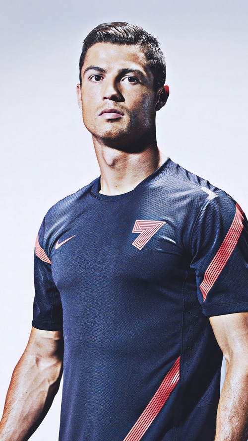 Cristiano Ronaldo in a dark blue Nike shirt