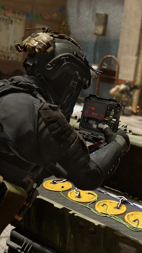 Soldier defusing a bomb in Call of Duty: Modern Warfare 2