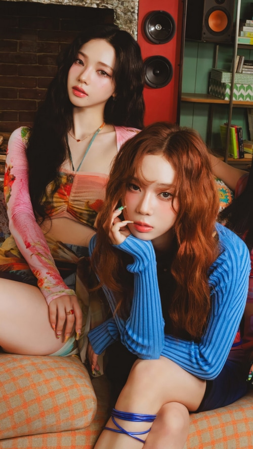 Aespa Karina and Winter posing on a couch