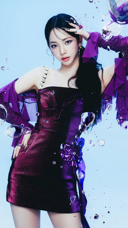 Karina from Aespa in a purple dress with crystals