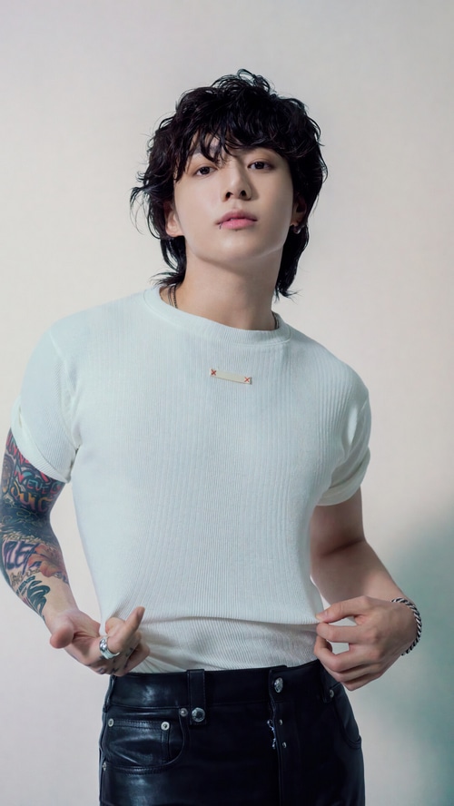 Jungkook in a white t-shirt and black pants