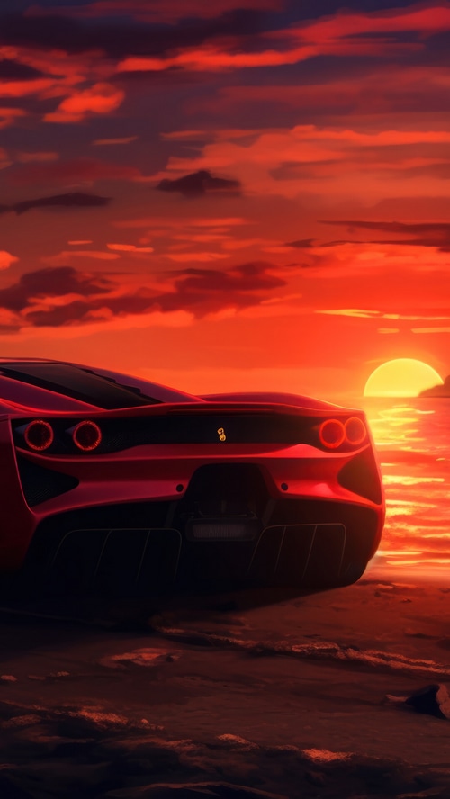 Red Ferrari sports car on a beach at sunset