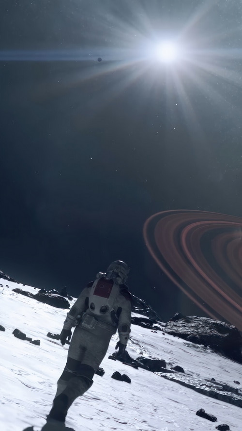Starfield astronaut on a snowy planet with Saturn-like rings