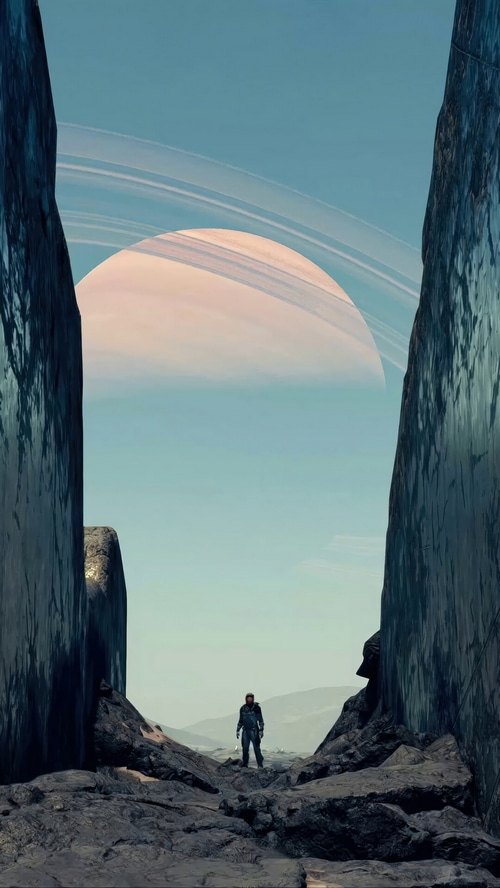 Starfield astronaut stands on rocky alien planet with Saturn-like planet in sky