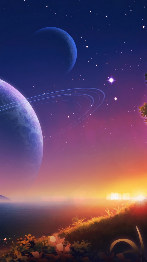 Planets and stars over a sunset landscape