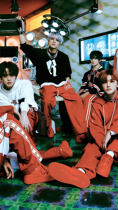 NCT DREAM members in a medical-themed room