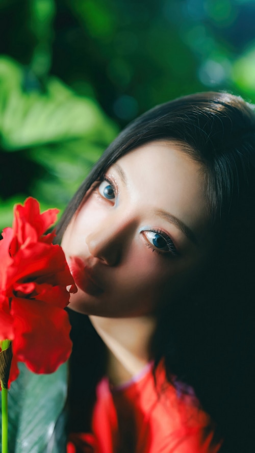 Ningning from Aespa with a red flower