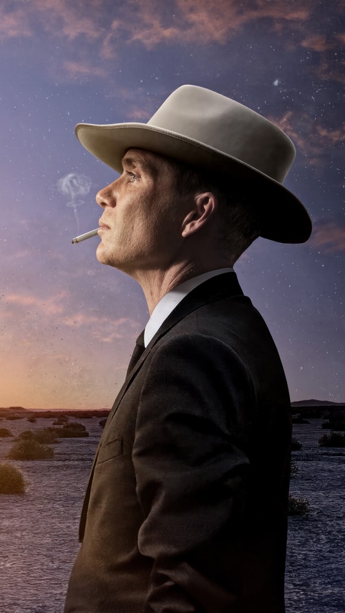 Cillian Murphy as Oppenheimer in a suit and hat