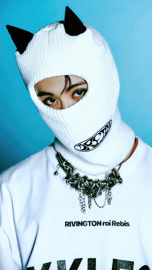 Mark NCT DREAM wearing a white balaclava with horns