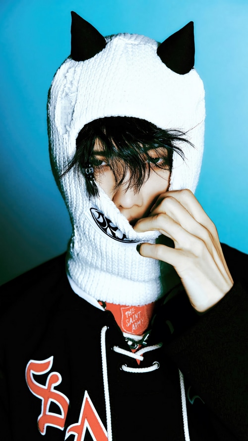 Jisung from NCT DREAM wearing a panda hat