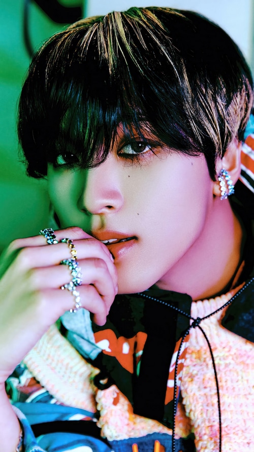 Haechan of NCT DREAM with rings and earring