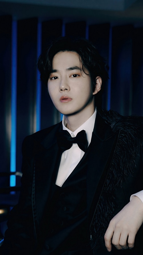 Suho Kim Jun Myeon in a black suit